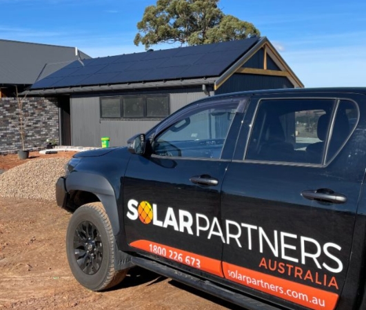 Solar Partners australia with car at property
