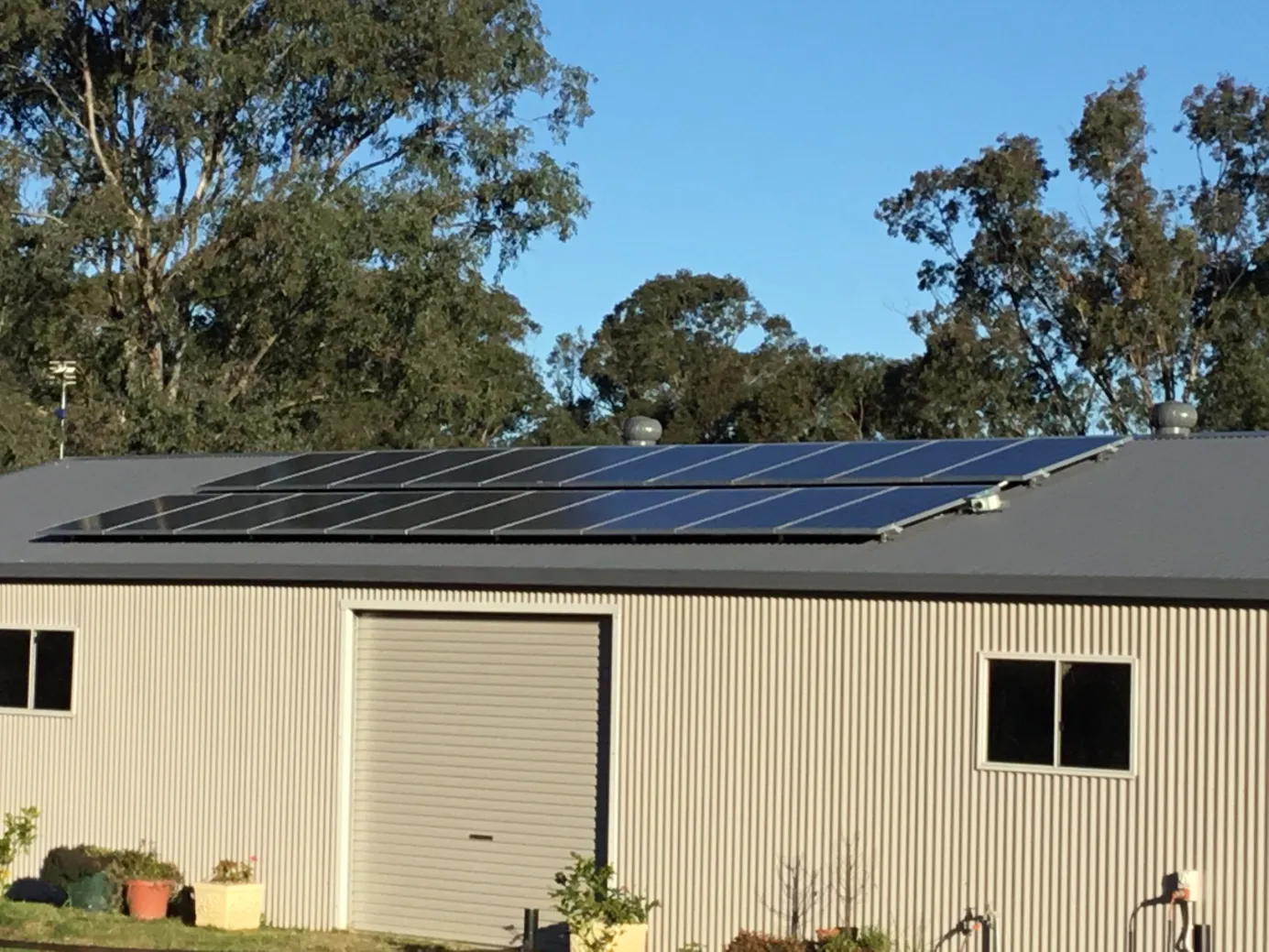 Solar panels installed on a rural shed Solar panels installed on a rural shed